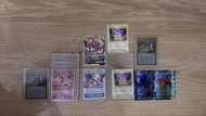 標題：Pokemon 美版寶可夢卡牌10張｜噴火龍、M比雕EX全圖、火焰雞TG、蕾冠王VMAX，2張Illustrator復刻卡
