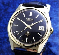 Grand Seiko 6145-8000 Cap 金/鋼，黑色錶盤 男士自動上鍊（狀況良好，已修）/ 36 毫米