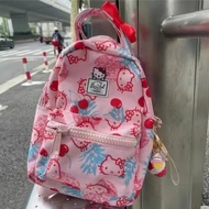 กระเป๋าเป้สำหรับการเดินทางกลางแจ้งของเด็กนักเรียนกันน้ำความจุขนาดใหญ่น่ารักการ์ตูน Hello Kitty ใหม่ของผู้หญิงกระเป๋านักเรียน
