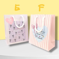 Portrait motif paper bag 24.5x19.5x9.5