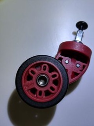 * fix your own delsey suitcase broken wheel. DIY repair. red colour luggage wheels with one screw at the top. new not used. make your baggage smoothly again
