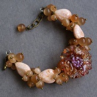 Floral beige pink bracelet with coral, cat's eye and handmade lampwork flower