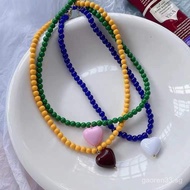 suzyacc kr Designer style color-blocked heart bead necklace for women2026New Year ins Clavicle Chain