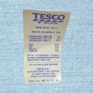 vintage paper receipt from a Tesco in Malaysia, dated July 9, 2013
