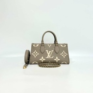 LV 斑鳩灰牛皮OnTheGo East West手提斜背包M23641