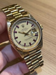 Rolex 18038 18k YG Day-Date Ruby Bauguette String Dial