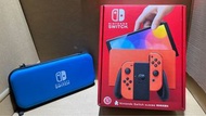 （任天堂Nintendo Switch 最新OLED版本 亮麗全紅色 遊戲機）99.9％ 最新版 原裝 （行版）任天堂 Nintendo Switch 馬里奧 亮麗紅 特別版 大全套 Boxset（香港原廠代理保養 可放心購買）馬里奧亮麗全紅色色 特別版 隨機奉送 亮麗藍色便攜包一個 及已加保護Mon貼 實物如圖