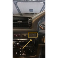Charger blank switch holder on BMW E30 sedan car