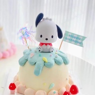 Pacha dog decorates birthday cakes and miniatures