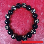 6-character mantra bracelet carved with plain black stone beads