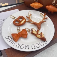 LNBE Simulated Food Keychain, Alkaline Water PVC Bread Key Ring, Cute Style Hand Croissant Model Han