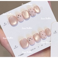 Moonlight cat eye fake nails in pastel pink with miffy rabbit and polka dots super cute hot trend