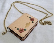 Coach淺橙花花小廢包