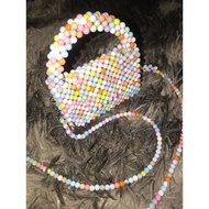 Beaded mini hand and sling bag (H: 2.5" W: 1.5" L: 4") for kids
