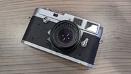 Leica M2 button with Summicron f2