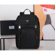 The First Launch 2VZ135 Backpack This Nylon Backpack has Saffiano Leather Trim, Use Creative and Tec