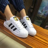 Adidas Adidas clover รองเท้าผ้าใบผู้ชาย และ ผู้หญิง SUPERSTAR classic gold label shell head รองเท้าผ