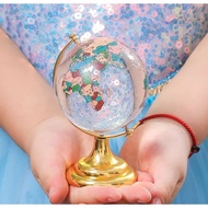Gold leg patterned crystal globe