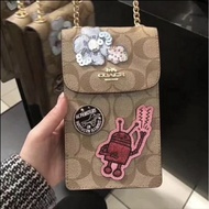 Coach phone bag brown