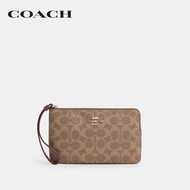 COACH กระเป๋าคล้องมือผู้หญิงรุ่น Large Corner Zip Wristlet In Signature Canvas CZ277 IMXHE สีน้ำตาล