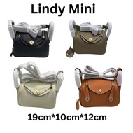 Lilly-19 MINI Togo Leather Sling Bag