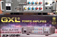 แอมป์ GXL รุ่น GLA - 329 กำลังขับ 2×50 W (RMS) ใช้ไฟบ้าน AC 220 V และใช้ไฟรถยนต์ DC 12 V.มีสินค้าพร้