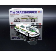 Kaido House X Mini GT 1:64 #KHMG167 Nissan Skyline GT-R R34 Tamiya The Grasshopper (New & Sealed)