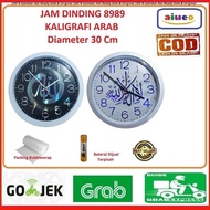 TD42FE Jam Dinding Ogana 8989 Kaligrafi Arab Diameter 30cm Quartz