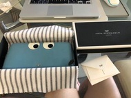 Anya Hindmarch ‘Eyes’ wallet in blue with removable 'Aquarius' sticker 