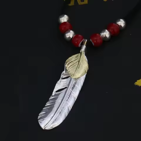 Takahashi Goro's Goro Gold-Plated Feather Pendant Stylish Unisex Design