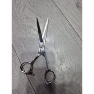Gussi brand scissors, professional cutting glue for the hair industry