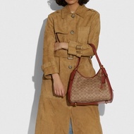 Sonia _ Usa Korea-Coach Counter Lori Caramel logo