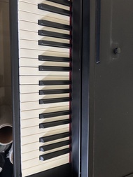 Roland rp102 digital piano with bench