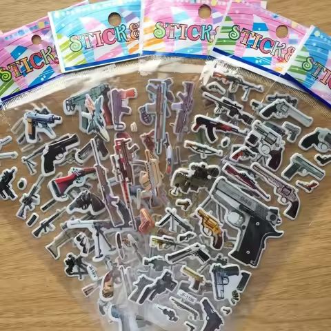 HOT!1PCS world famous gun 3D stickers home wall decor cartoon mini sticker fridge notebook for kids