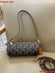 Coach 馬車印花圓筒斜背包