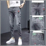 baggy jeans levis 501 original Seluar jeans lelaki musim panas gaya baru jenama bergaya langsing kaki elastik 2024 versi Korea seluar panjang lelaki yang bergaya