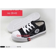 Black and white school shoes with genuine camvas material