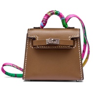 Hermès Etoupe Tadelakt Micro Mini Kelly Twilly Bag Charm Gold Hardware, 2022