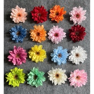 Big, sharp brown dahlia flower head. Cheap flower shop.