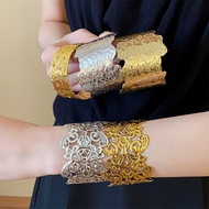 Metal flower hollow opening bracelet for women's personalized retro fashion bracelet for European an