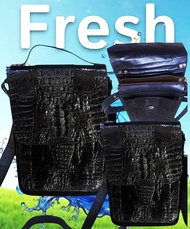 Crocodile leather shoulder bag black rolled leather.  Bag dimensions: 8.0 inches wide 10 inches high