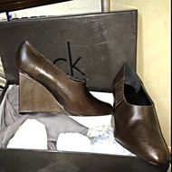 Brand new Calvin Klein Brown Wedge Boots