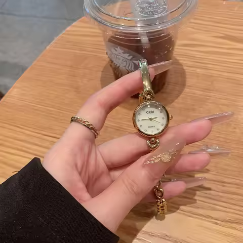 New simple temperament small gold watch fashionable versatile women's hand watch small exquisite qua