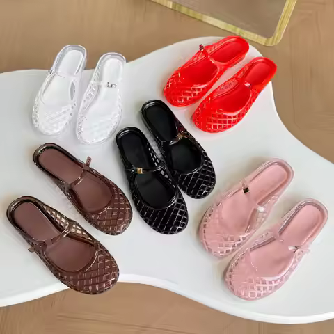 Hollow out jelly shoes with a single toe cap, half trailer, crystal shoes, one foot kick, perforated