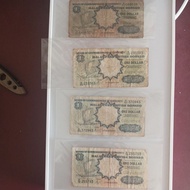 1 dollar malaya and borneo condition(F) dirty got tear hole,no cod