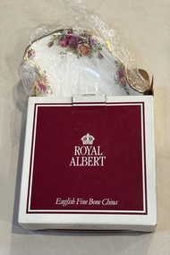 A collectible Royal Albert fine bone china cake plate and server set, likely featuring the classic "