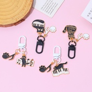 Fashion Musical Piano Cat Keychain Black White Metal Kitty Paws Pendant Backpack Accessories Keyring