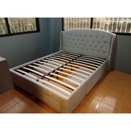 Single padded bed frame with pull out