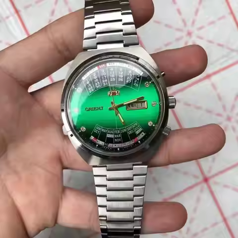 automatic mechanical unisex Orient watch with rotating large dial, fully functional stainless steel 