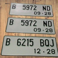 plat motor standar lengkap dengan logo Samsat dan bacaan korlantas polri  di sisi kiri dan sisi kana